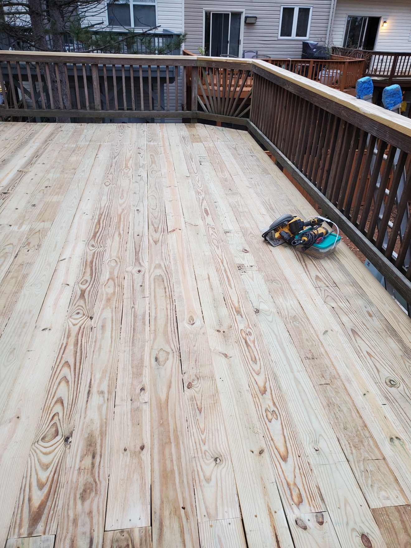 New deck boards laid over the rebuilt structure
