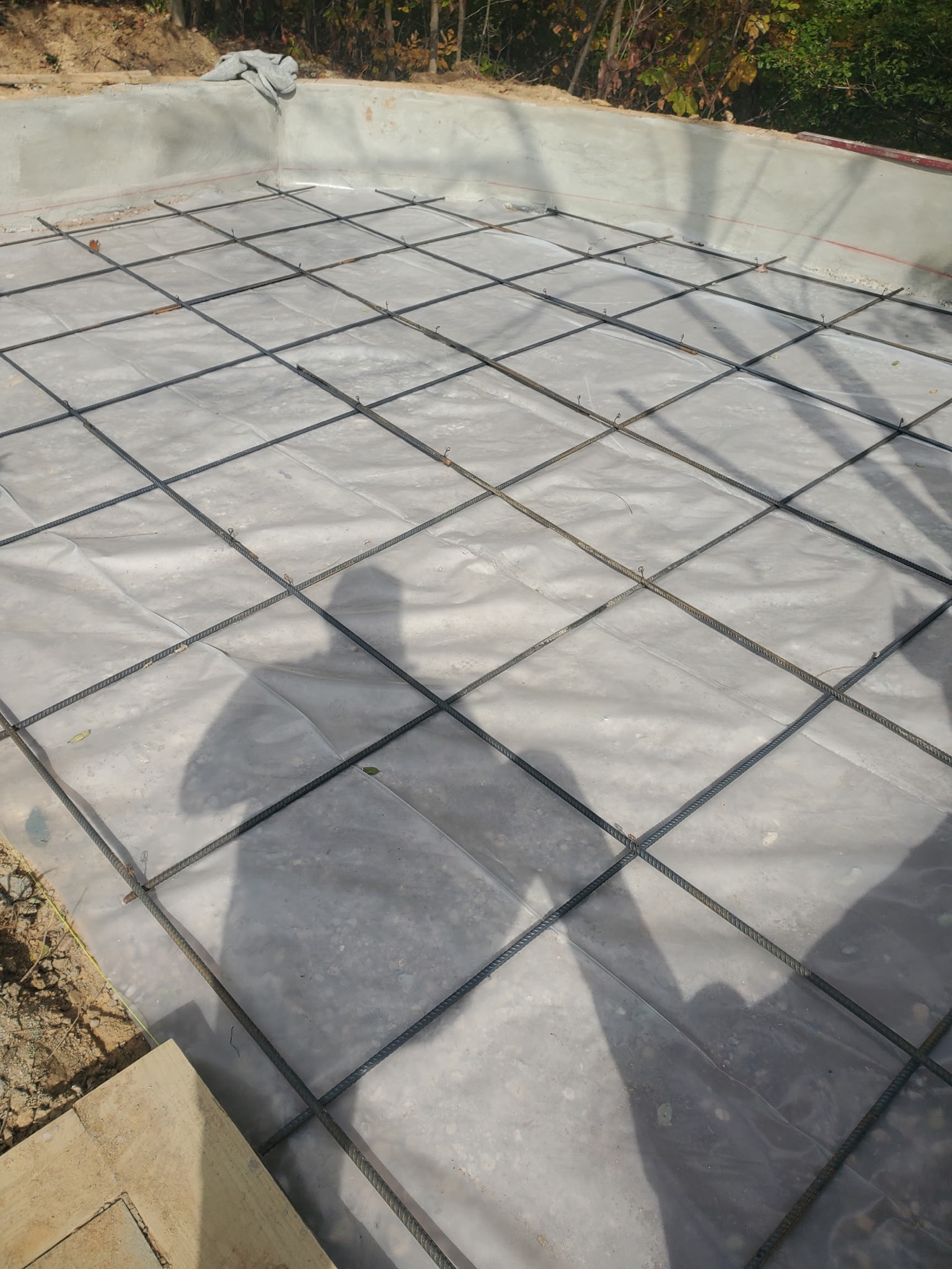 Rebar grid tied over a vapor barrier before the pour